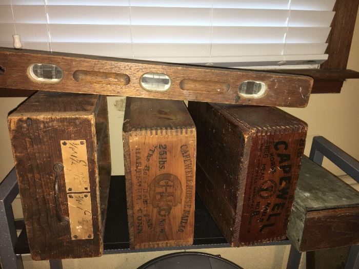 Assorted antique wooden boxes.