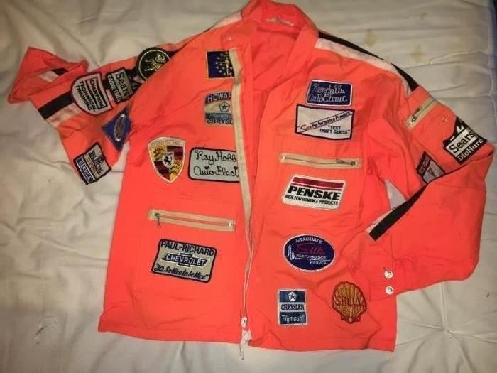 Sun Service Equipment jacket with assorted patches.