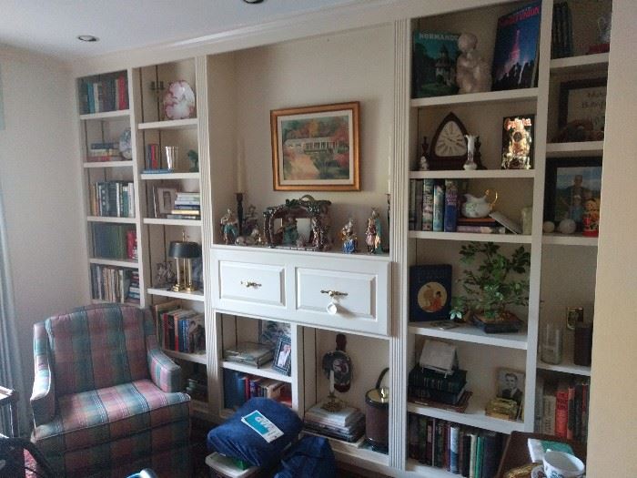 Great room bookshelf, filled with (you guessed it!) books, collected small treasures, bling, blang and a pinch of bada boom.