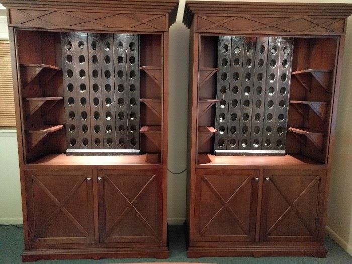 A wonderful pair of custom made, illuminated wine cabinets. The next pic shows them opened. 