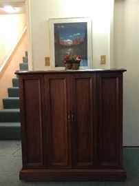 Wow, what a great idea for a bar! It's a vintage 1970's TV cabinet and super heavy. Next pic shows it revealing the candy within...                                         ALWAYS hide your candy.