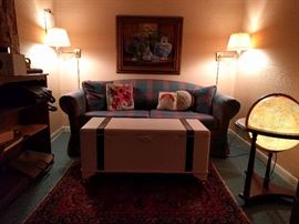 Yet another sleeper sofa. This one is a love seat size. They either had a lot of sleepy guests, they couldn't hold their liquor and had to sleep over, or there was a LOT of love goin' 'round that basement...