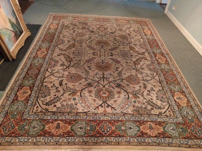 Hand woven, 100% wool Indian rug, Agra design, measures 8' x 10'.