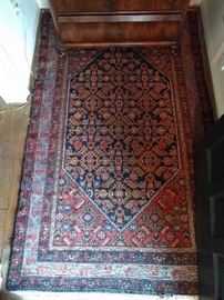 Right as you enter the front door, to announce that these people had $$$ and taste, is a hand-woven, 100% wool Persian Bidjar rug. The colors are fabby, condition is very good, with even pile; measures 3' 4 x 6' 7".