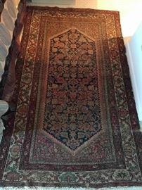 Ahh, now here's a rug you won't see very often. It is a hand-woven, 100% wool Persian Malayer rug, that's at least 80 years old. The colors are fabby, condition very good, with even pile; measures 3' 4 x 6' 7".