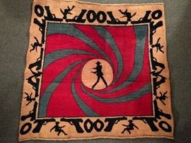 Check this out! The ultimate man-cave accessory!          It is a hand-woven, 100% wool Persian rug, inspired by, what else James Bond. You can choose to be Goldfinger or Octopussy; measures 3' 5 x 3' 6".