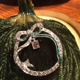 Art Deco Emerald & Diamond Wreath Brooch Platinum with 40 diamonds. Diamonds are .4 carat each with .25tw in emeralds with emerald cut articulating diamond.