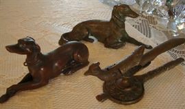 Brass bird Nutcracker, one Dog may be bronze, the other brass