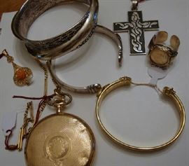 Gold and silver.  The bracelets are "Until there is a Cure" Bracelets.  More jewelry not shown