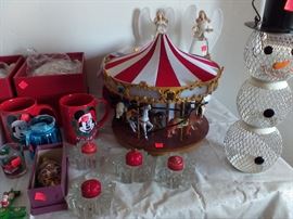 Christmas decor and small carousel.