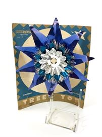 

Vintage early 1940s Doubl-Glo colored tin tree topper in the original packaging. Blue on silver aluminum. 7 1/2" across and 7 1/2" tall. Has a spot to insert your own vintage light bulb to light it up!

 