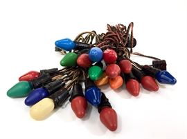  	
Edit 
Lot of three sets of Antique Noma Christmas Lights With G E Mazda Lamps

Lot of three sets of Antique NOMA cloth corded light string with eight brown Bakelite sockets. Includes eight working C9 swirl light bulbs and bonus 2 flasher adapters. Cord measures 48" long. Most with original G E Mazda lamps. Tested and works.