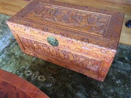 Heavily carved cedar trunk with ASIAN motif