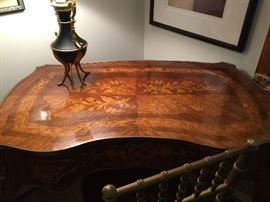 Inlaid French style desk with bronze ormolu accents
