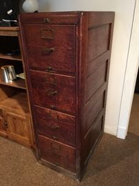 Oak file cabinet finished with sides