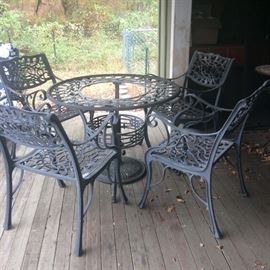 Glass top outdoor table /four chairs