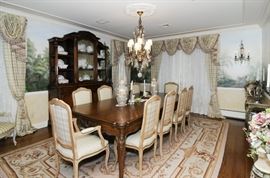 Antique French walnut buffet with glass top, Auffray fine French style dining able and ten chairs, Stark Aubusson design 10' x 14' carpet, pair of wall consoles, antique French bronze and rock crystal chandelier