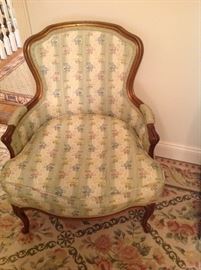 One of a pair of bergere chairs