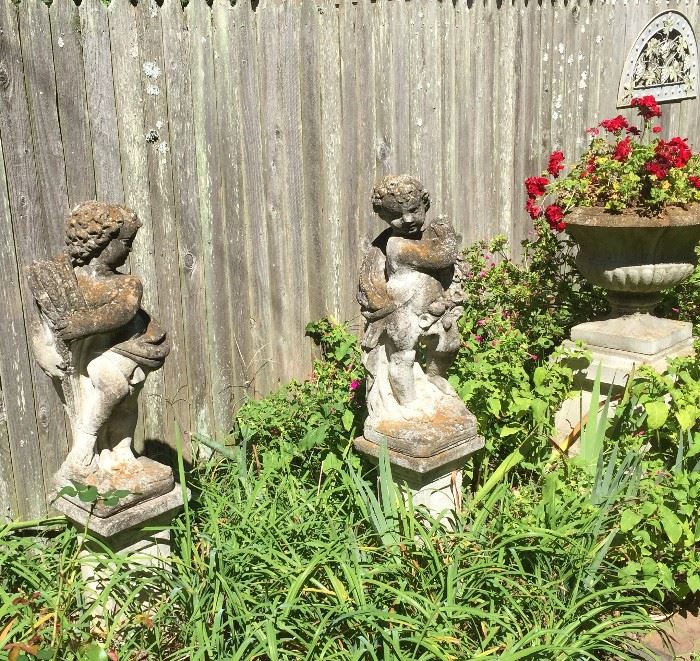 The four season vintage yard sculptures on plynth and large urn on plynth  