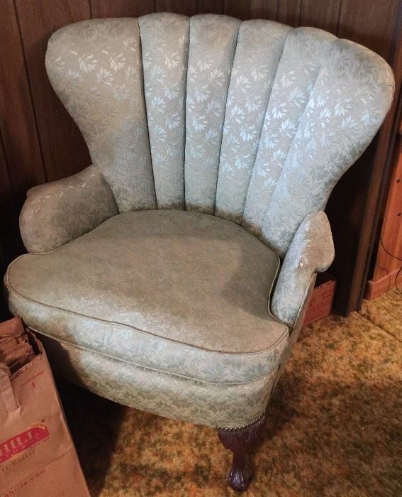 Vintage chair with great bones.  Tufted back, fitted seat and shaped arms.