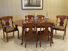 Pennsylvania House cherry dining room table with six chairs.
