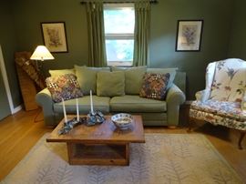 Green sleeper sofa, wing chair, etc.
