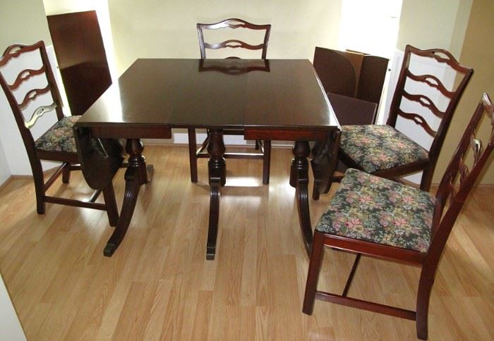Duncan Phyfe Style Vintage Mahogany 3-Pedestal Drop Leaf Table with 3 additional Leaves and Custom Table Pads shown with 4 Mahogany Side Chairs with Tapestry Upholstery 