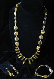 Tiger Eye Necklace shown with a pair of Tiger Eye Pierced Earrings and Bracelet
