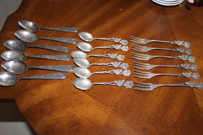 Selection of Sterling spoons.