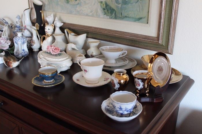 Selection of bone china tea cups. Lenox figures.