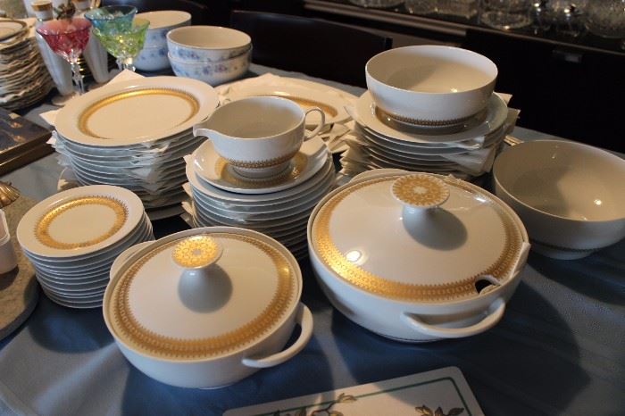 Gold and white dinner service.