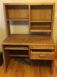 Solid oak, 2 piece computer desk and shelving unit. Beautiful condition.