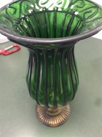 green vase with metal base