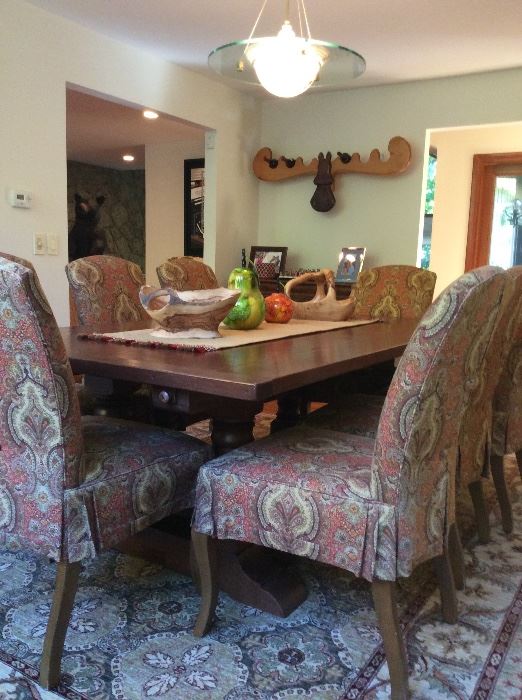 Cherry dining table with 8 upholstered chairs. Includes 2 leafs. ($3000)