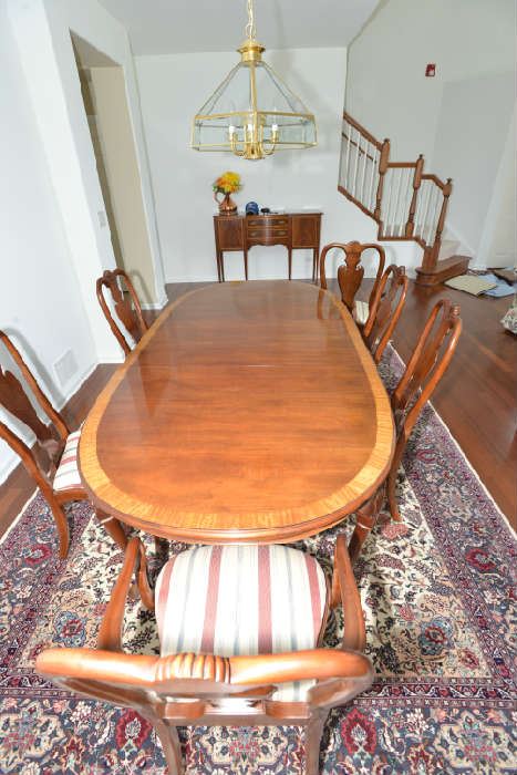 Ethan Allen Dinning Room Set -  Table with 2 extensions  89 1/4" long (with one extension in as shown) x 29 1/2 " tall 45 1/4" wide. additional extension is 22" wide.  Comes with felt one inch     thick protective heat resistant padding.  6 Chairs