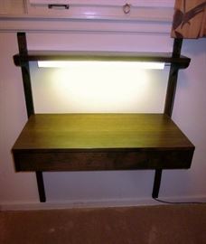 Mid Century Kopenhavn wall mount desktop with drawer.  Has upper shelf with light (which probably isn't original to the piece).  33" wide