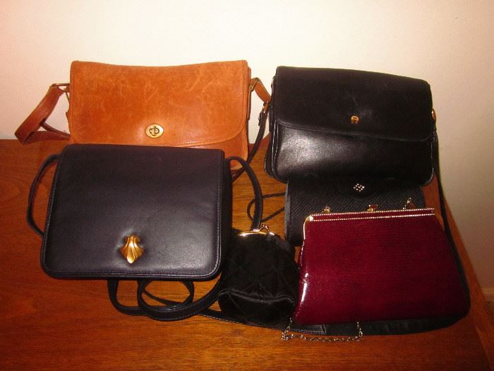 Leather purses:  Coach, Liz Claiborne, Entienne Aigner, plus three small evening bags.