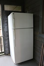 Good condition, smaller Kenmore refrigerator, perfect for garage or basement