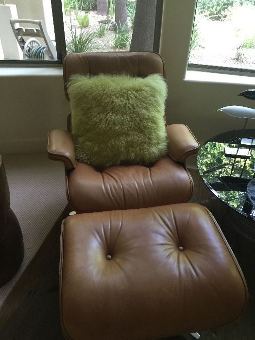 Eames lounge chair with furry fun pillows sold separately chair is in very nice condition no oil spots where head goes!!