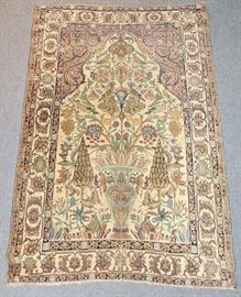 Lot 129 Persian Isfahan Carpet with Urn, Tress, Birds (75 x 49 in.)
