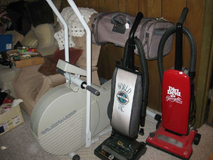 VACUUMS AND AIR CHALLENGE EXERCISE BIKE.