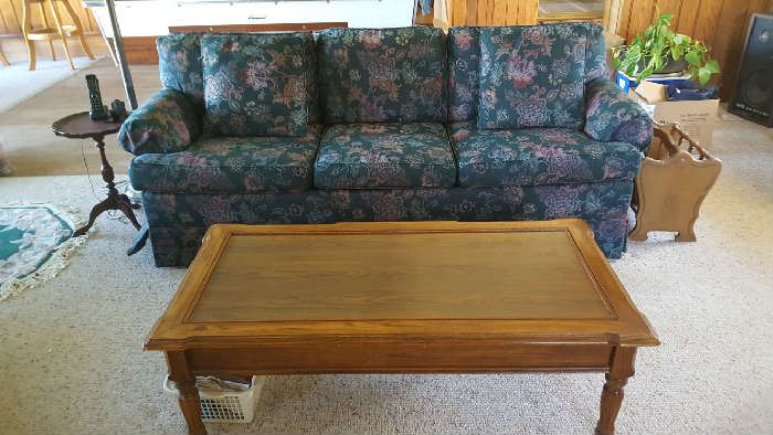 Floral sofa  $75  NOW  $37 Wood cocktail table  $25  NOW $12