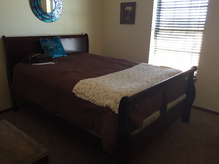 Queen size sleigh bed with new mattress set. Queen bedding set & sheets