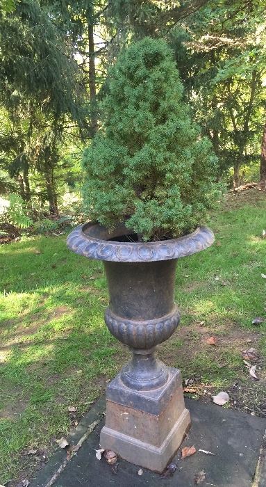 Antique cast iron urn with stand