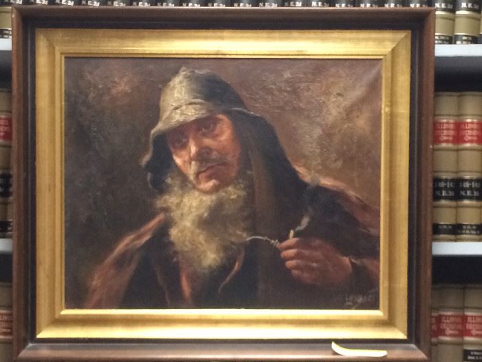 This an oil on can us of a fisherman. Signed K. K. Liember.   