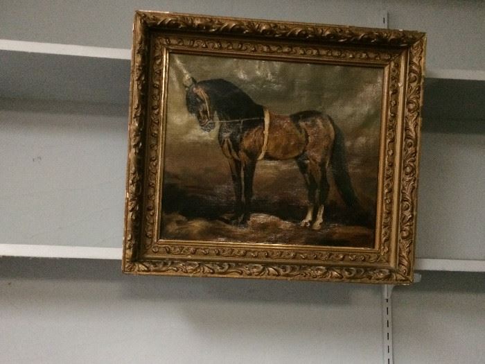 This is an oil on can us of a horse with original frame.
