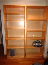 There are three of these solid wood bookcases