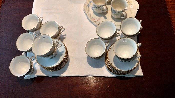18 cups and saucers, white with gold trim to match many patterns