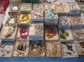 Necklace and earring sets.