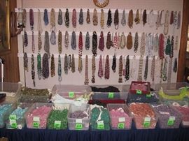 Glass beads in bundles marked Japan, western Germany, Czechoslovakia.